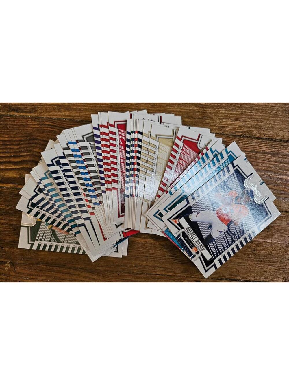 Lot of 34 - 2023 Panini NFL football cards. Unsorted - stars, rookies, more